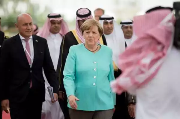 German Chancellor Angela Merkel Snubs Strict Dress Code As She Arrives Saudi Arabia. Photos